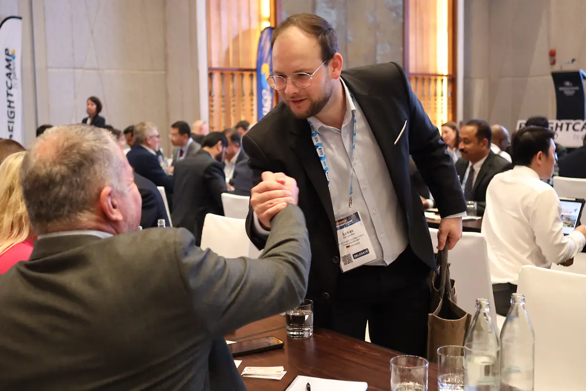 Freight forwarding professionals beginning a meeting at Freightcamp Bangkok 2025