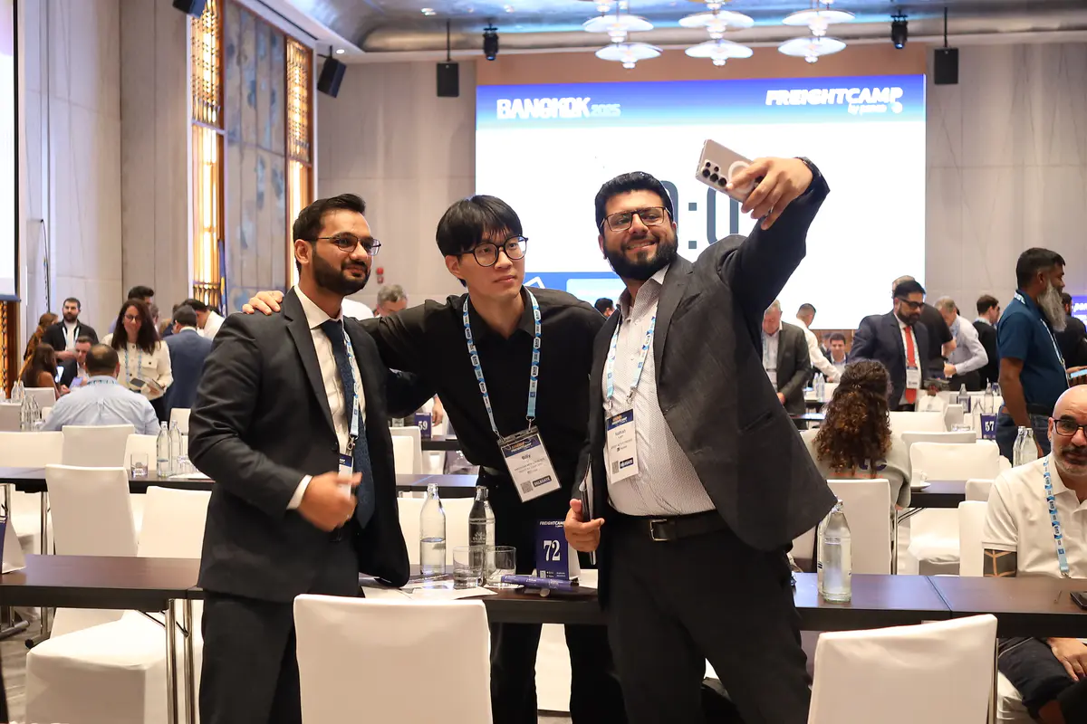 Freightcamp Bangkok 2025 delegates taking a selfie between business meetings