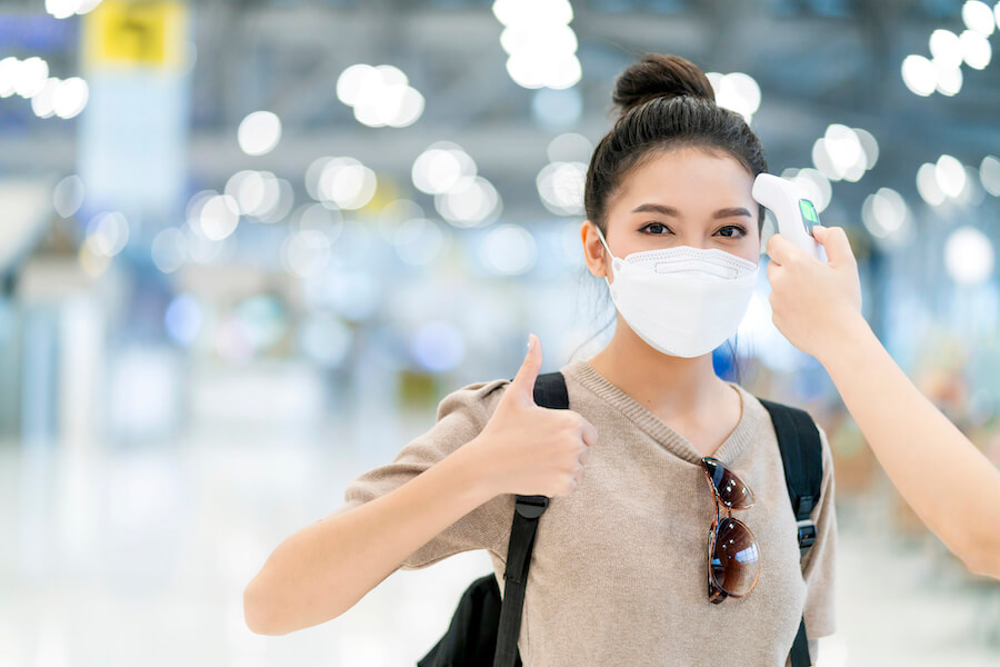 safety-travel-new-normal-lifestyleasian-female-traveller-wear-casual-cloth-temperature-check-detect-covid19-airport-terminal-before-going-abroad-travel-with-blur-airport-departure-terminal (1)